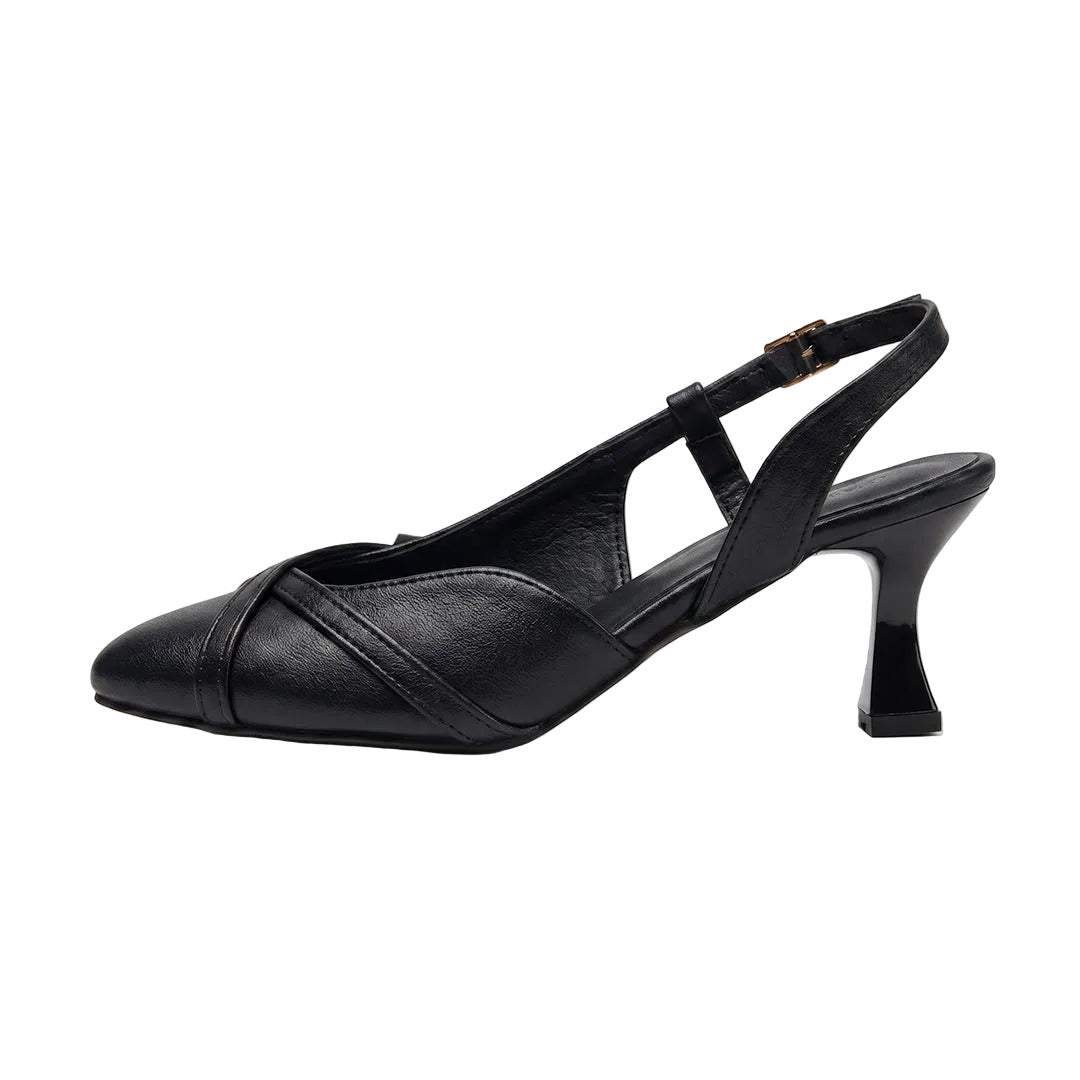 A single black leather slingback pump with a low kitten heel, side cutout, and a small gold-tone buckle on the ankle strap, shown against a plain white background.