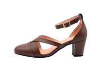 A brown leather block-heel sandal with crisscross straps and an ankle strap with a gold-tone buckle, shown in a side profile on a white background.