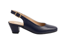 A single navy blue leather slingback pump with a low block heel and a gold buckle, shown in profile on a white marble background. The brand name 'UNCLE' is printed on the insole.