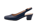 A single navy blue leather slingback pump with a low block heel and gold buckle, shown in profile against a clean white studio background. The brand name 'UNCLE' is visible on the tan insole.