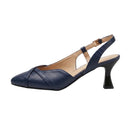 A navy blue leather slingback pump with a pointed toe, crisscross detail on the vamp, and a sculptural black kitten heel, shown from a side profile on a white background.