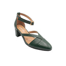 A dark green pebbled leather block-heel mule sandal with an ankle strap and a small gold buckle, shown on a white background. The insole is tan with the brand name 'UNCLE' printed on it.