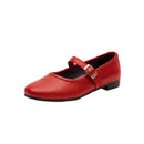 A red faux-leather Mary Jane flat shoe with a silver buckle strap, shown from a three-quarters angle on a white background.
