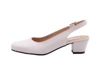 A white faux leather slingback pump with a low block heel and a small gold buckle, shown from a side profile on a light gray background. The insole displays the brand name 'UNCLE'.